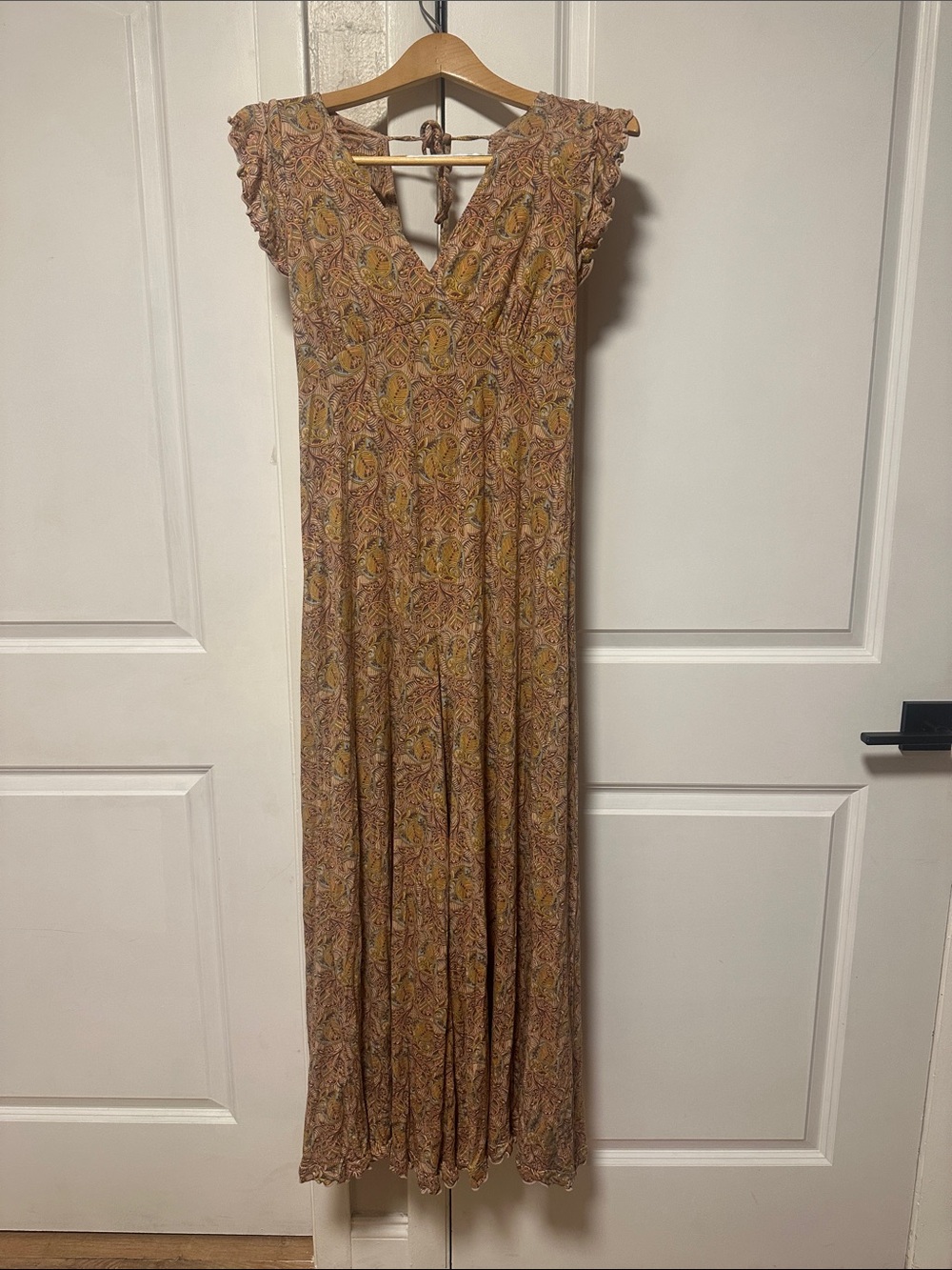 Anthropologie Floral V‑Neck Jumpsuit in Muted Pink and Mustard